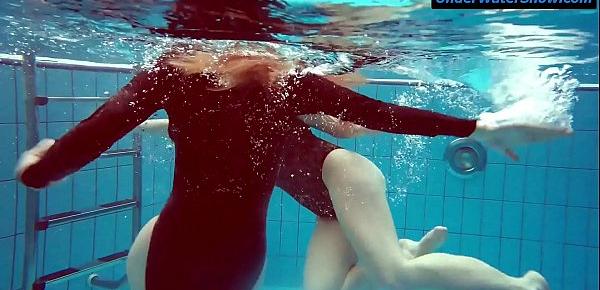  Two hot teens underwater